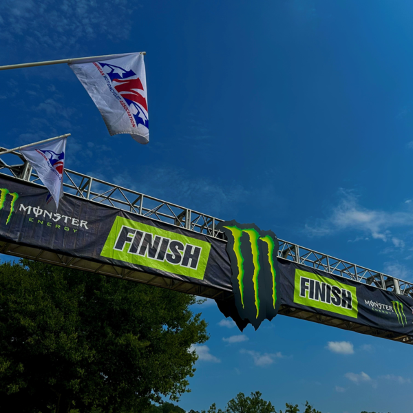 AMA Flags displayed at the finish line.